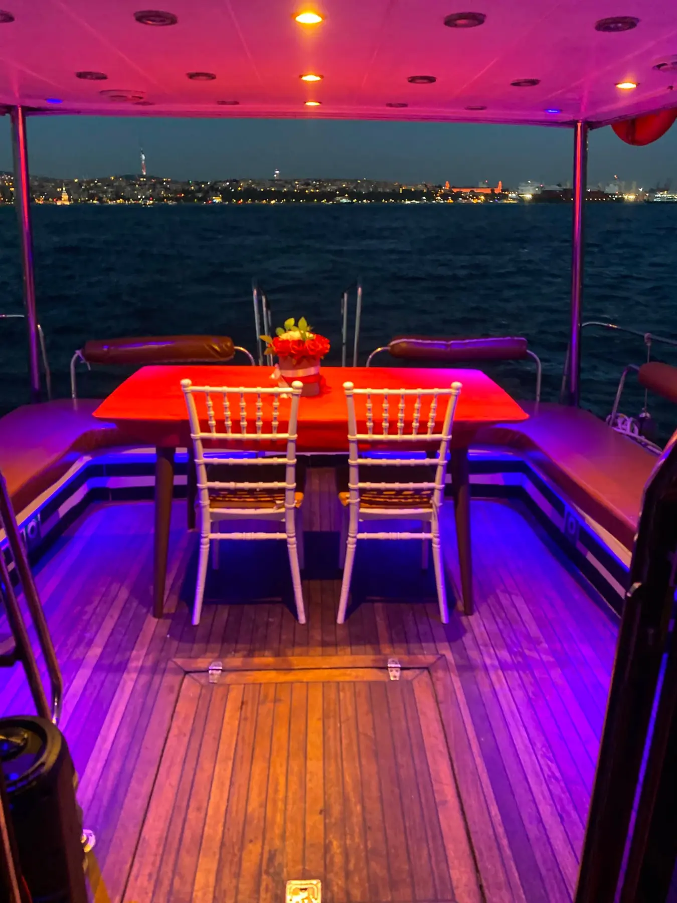 Private yacht dining deck prepared for an evening experience